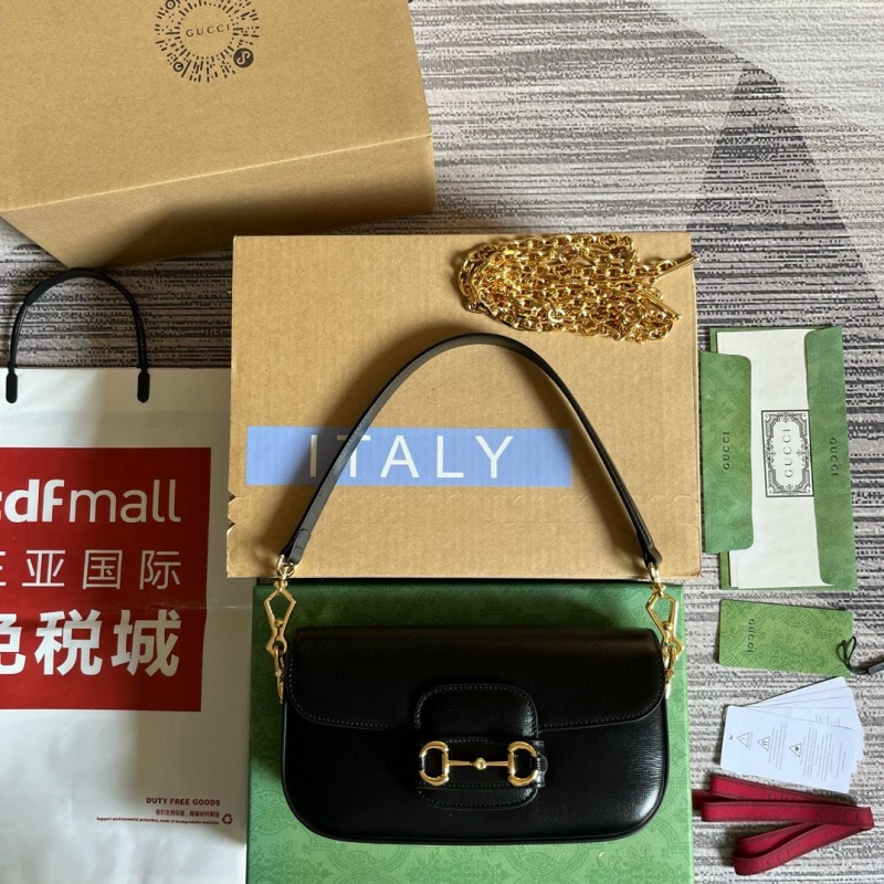 G*u*i top handle bags